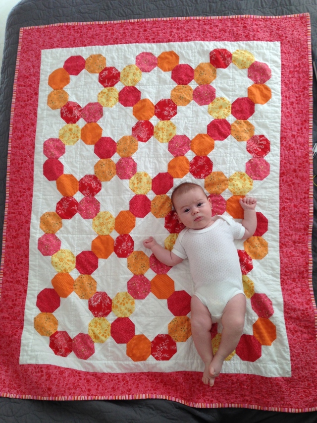 on her finished quilt!